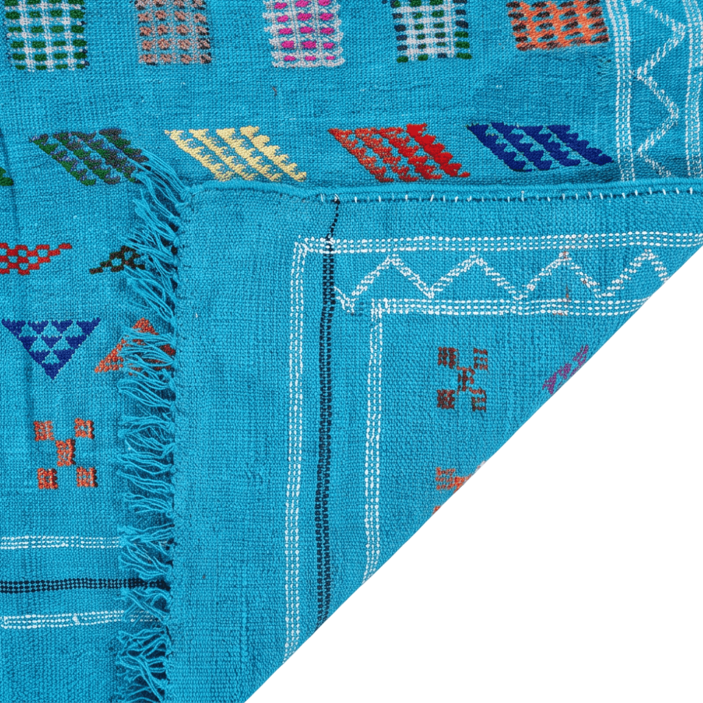 Tapis berbère bleu turquoise motifs multicolores