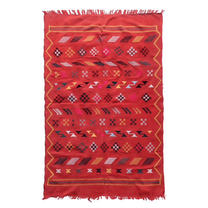 Tapis berbère rouge vif motifs multicolores