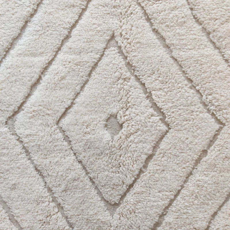 les losanges du tapis berbère blanc