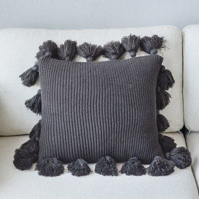 coussin pompon gris