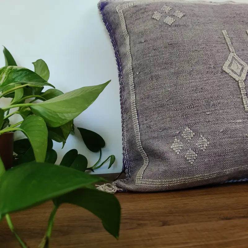 Détail artisanal du Coussin berbère