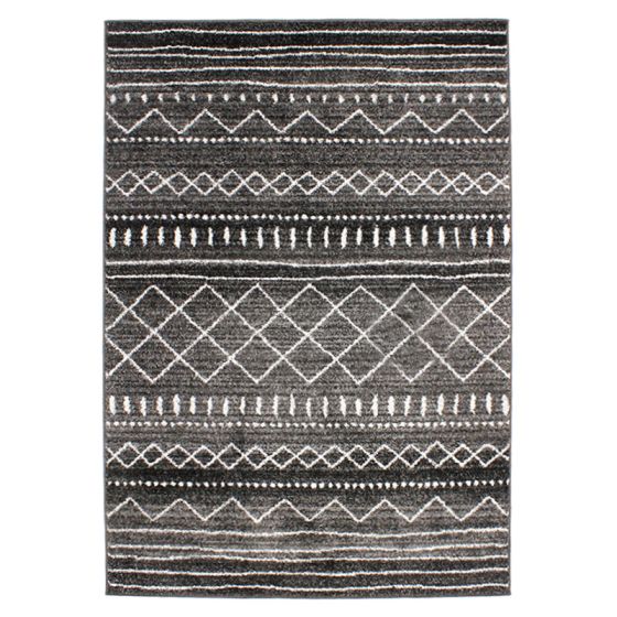 Tapis moelleux berbère marocain à motif géométrique noir et blanc.