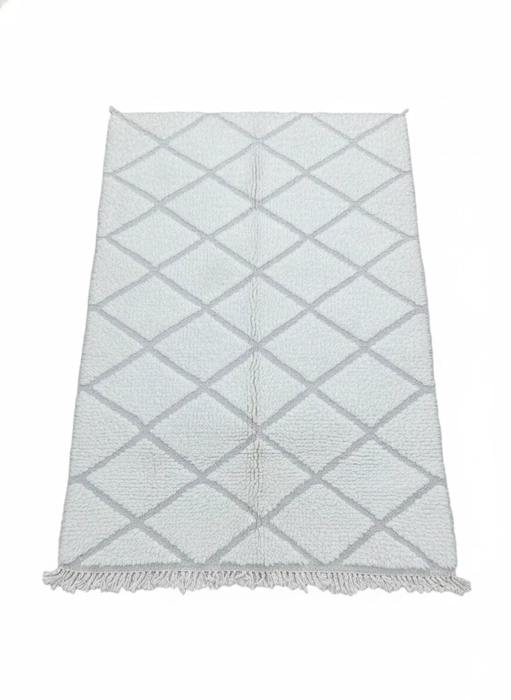 Petit tapis à petits losanges blancs