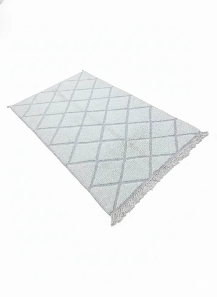 Petit tapis à petits losanges blancs