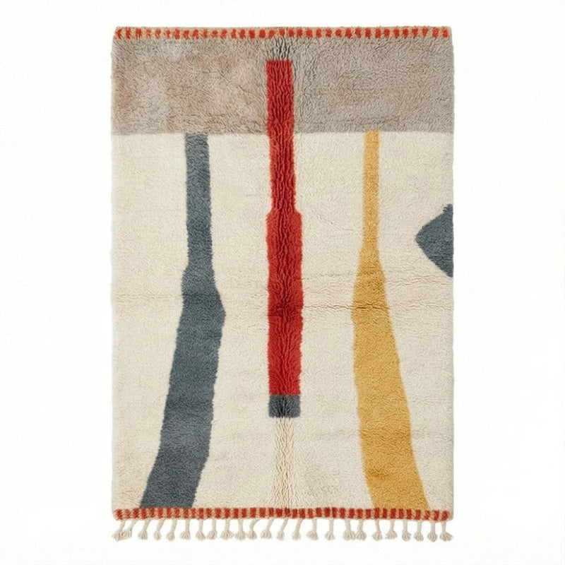 Tapis berbère en laine coloré moderne paré de motifs géométriques abstraits et franges décoratives.
