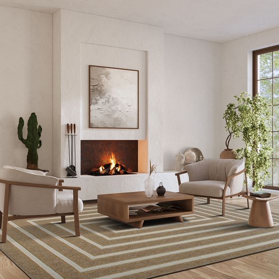 Tapis en jute à motif géométrique avec rayures concentriques beiges et blanches, posé dans un salon moderne.