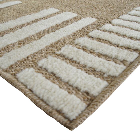 Tapis en jute beige à motifs de bandes blanches en relief.
