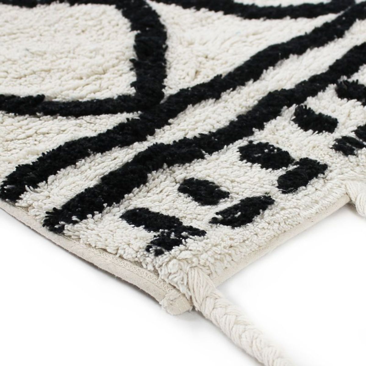 Détail du motif et de la texture en coton du tapis mural berbere