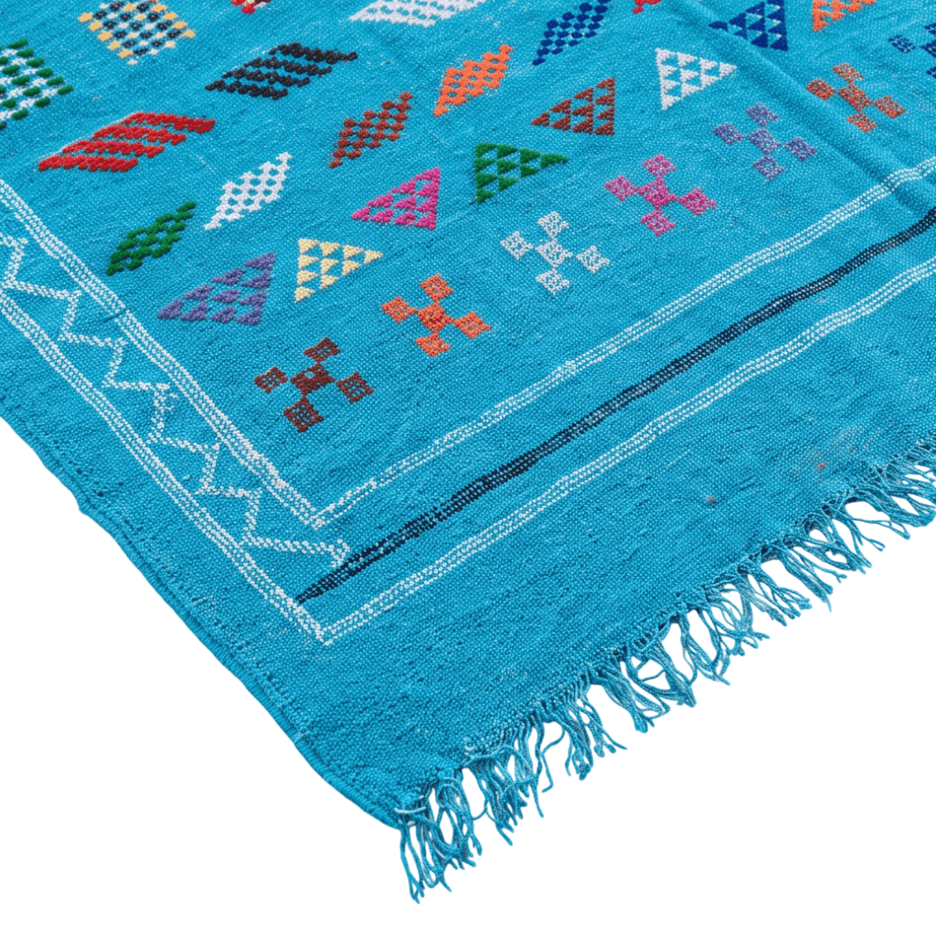 Tapis berbère bleu turquoise motifs multicolores