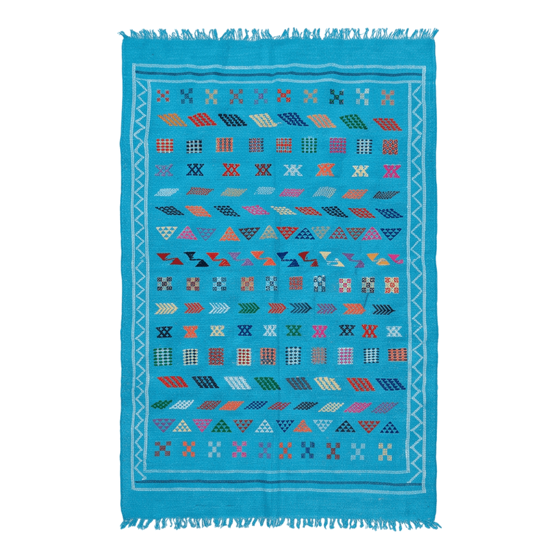 Tapis berbère bleu turquoise motifs multicolores