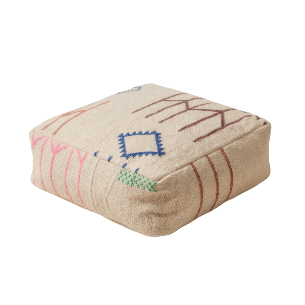 Pouf berbère écru motifs graphiques colorés