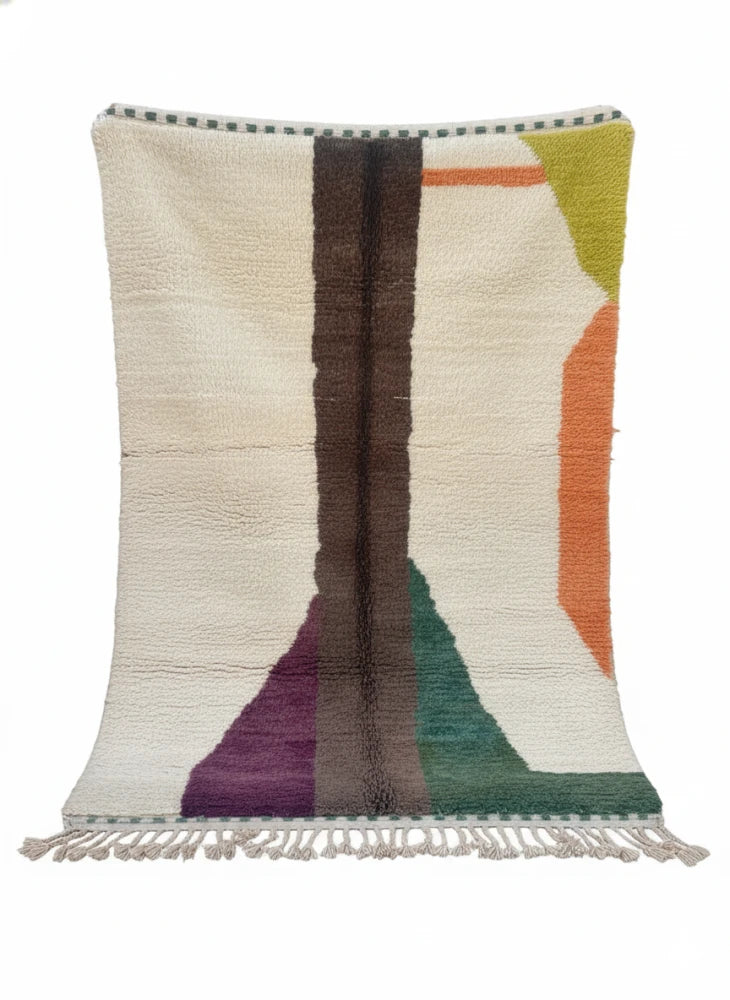 Tapis berbère moderne coloré en laine naturelle fait main par artisans, décor authentique façonné par savoir-faire traditionnel berbère.