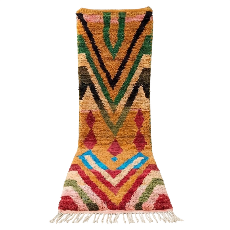 Tapis couloir berbère Boujad multicolore avec motifs géométriques de chevrons et losanges, et franges.