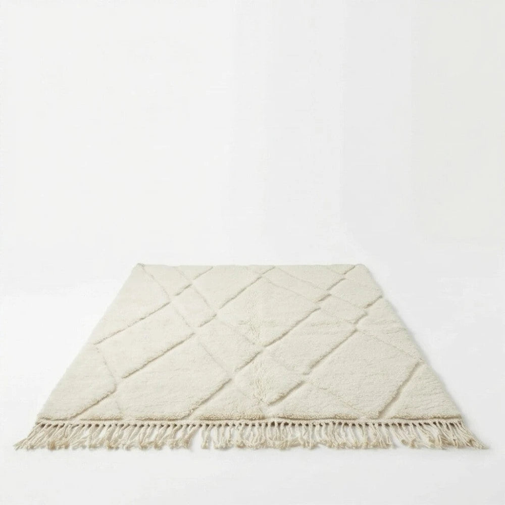 Tapis berbère à motifs blancs abstraits