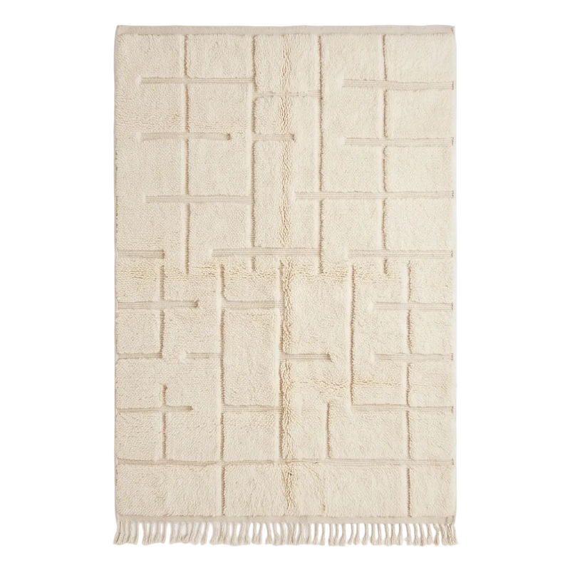 Vue de dessus du tapis Béni Ouarain écru et beige à quadrillage architectural en relief