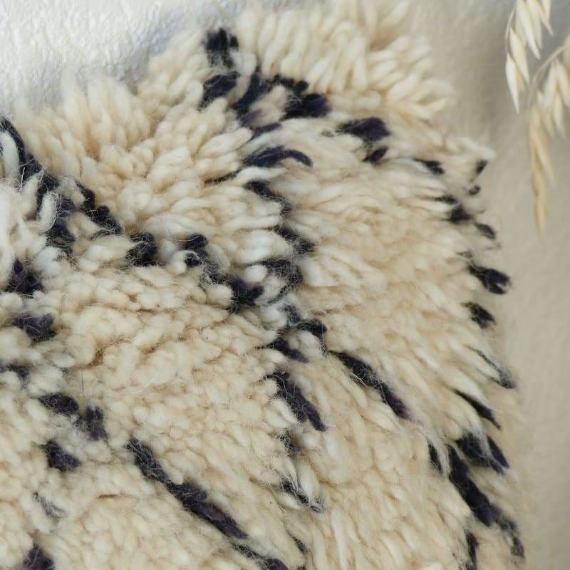 coussin laine blanc et noir