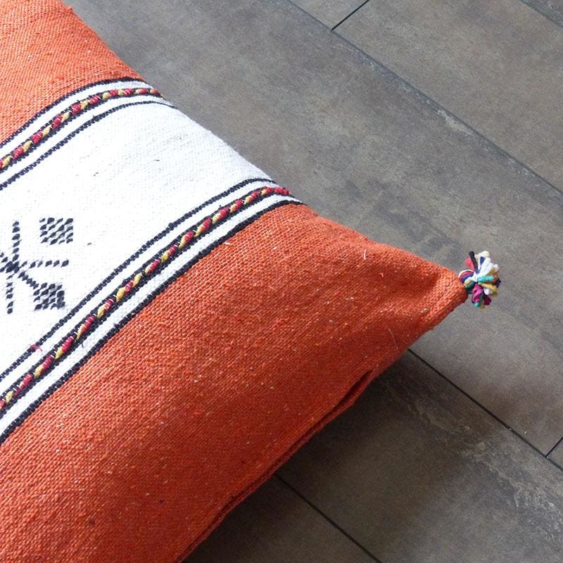 coussin à pompon orange