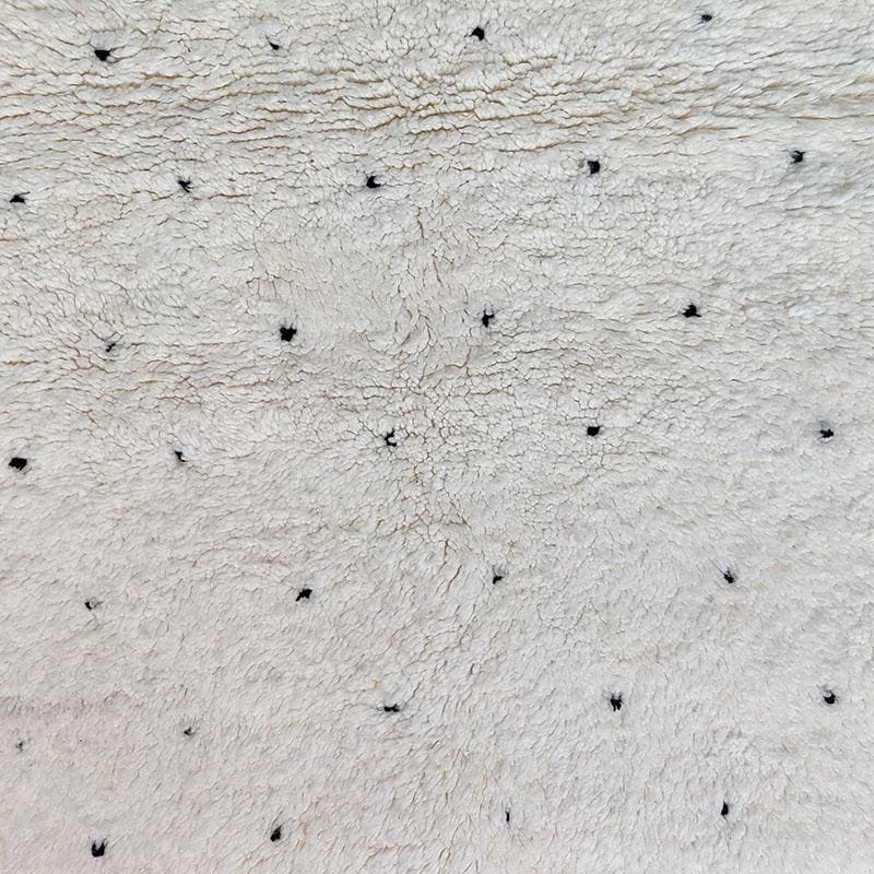 tapis laine points noirs