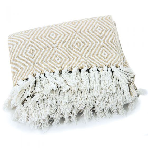 Plis du plaid en coton motif ikat blanc et beige