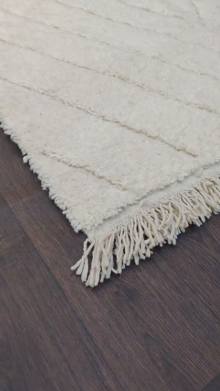 video du tapis berbère à losange blanc