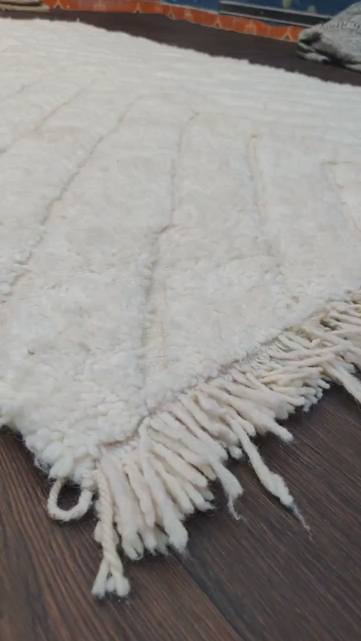 video du tapis shaggy blanc
