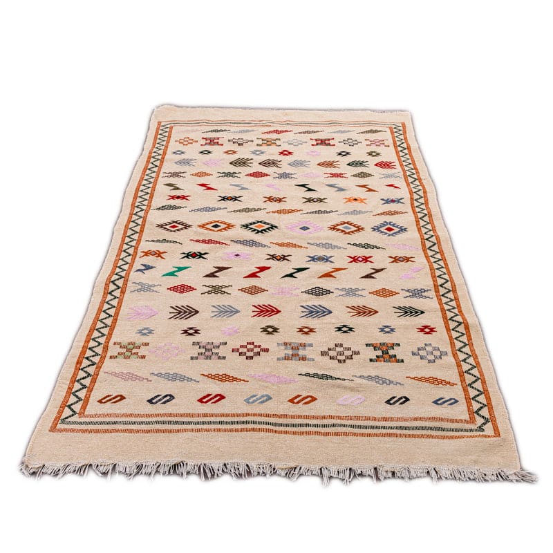 tapis ethnique beige