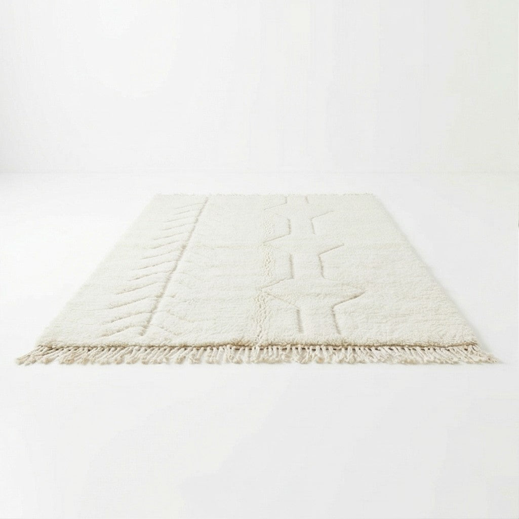Tapis beige en coton, décoration moderne, motif géométrique et franges.