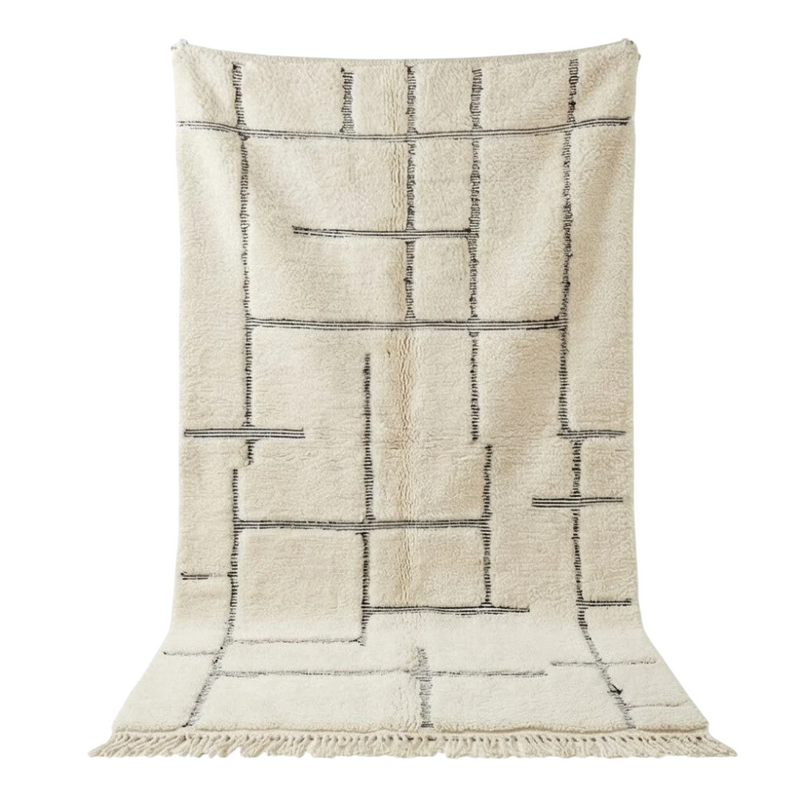 Tapis marocain en laine à motif graphique Mana de style géométrique.