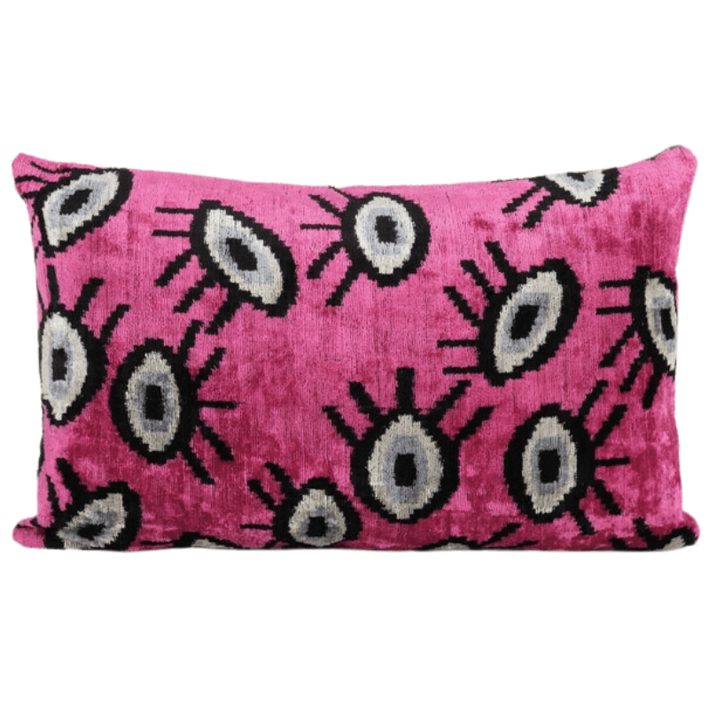 Coussin en velours Ikat rose yeux design