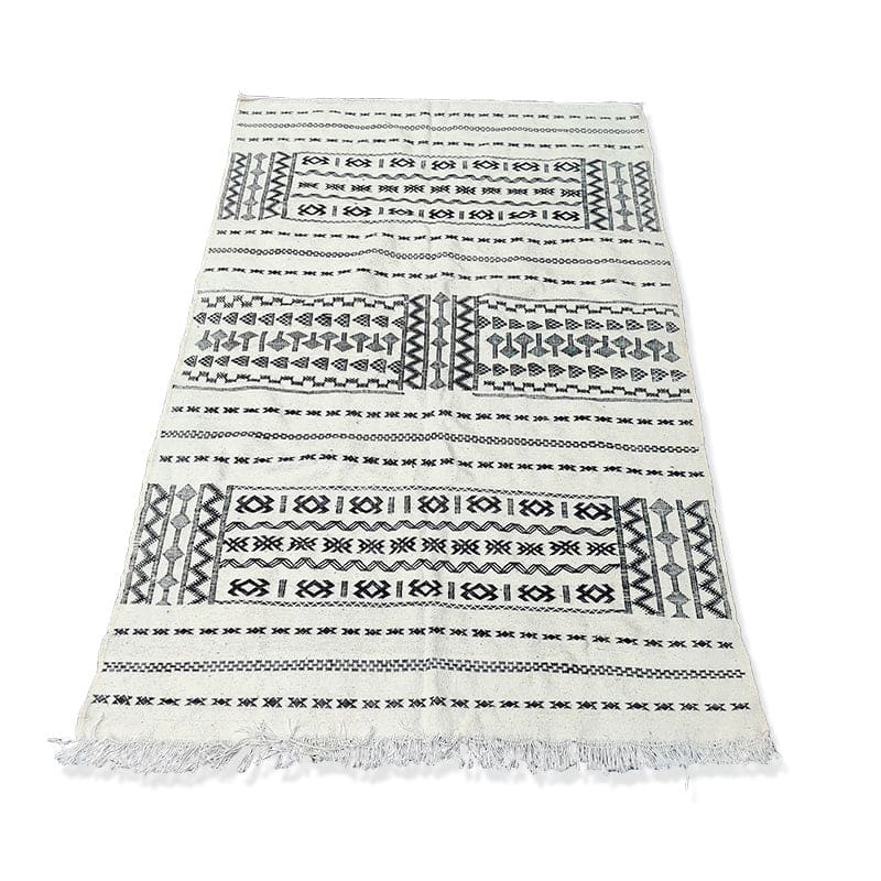 tapis blanc fait main motif turc