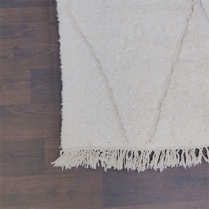 tapis laine blanche